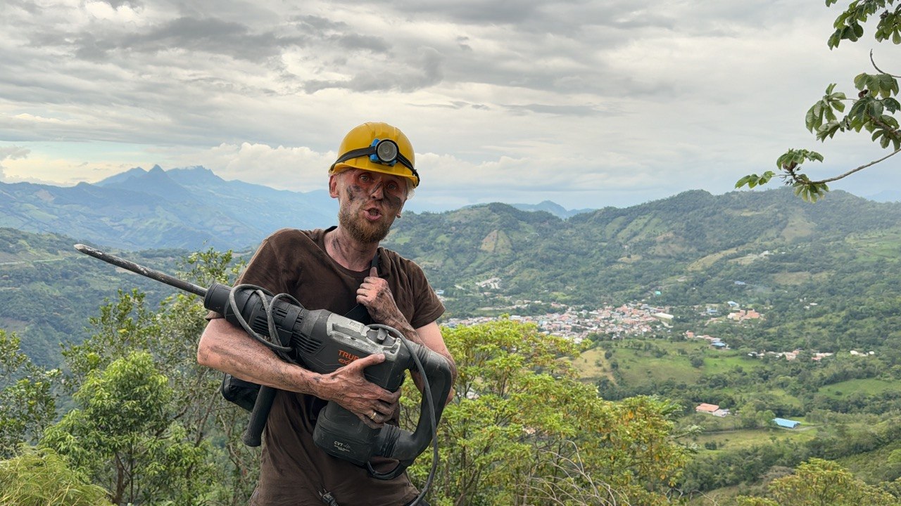 Vadim working with a drill at a mining site